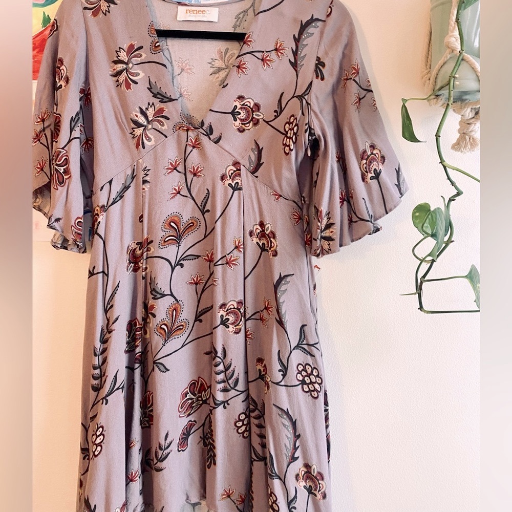 Float purple midi dress with v neck and zipper down the back.